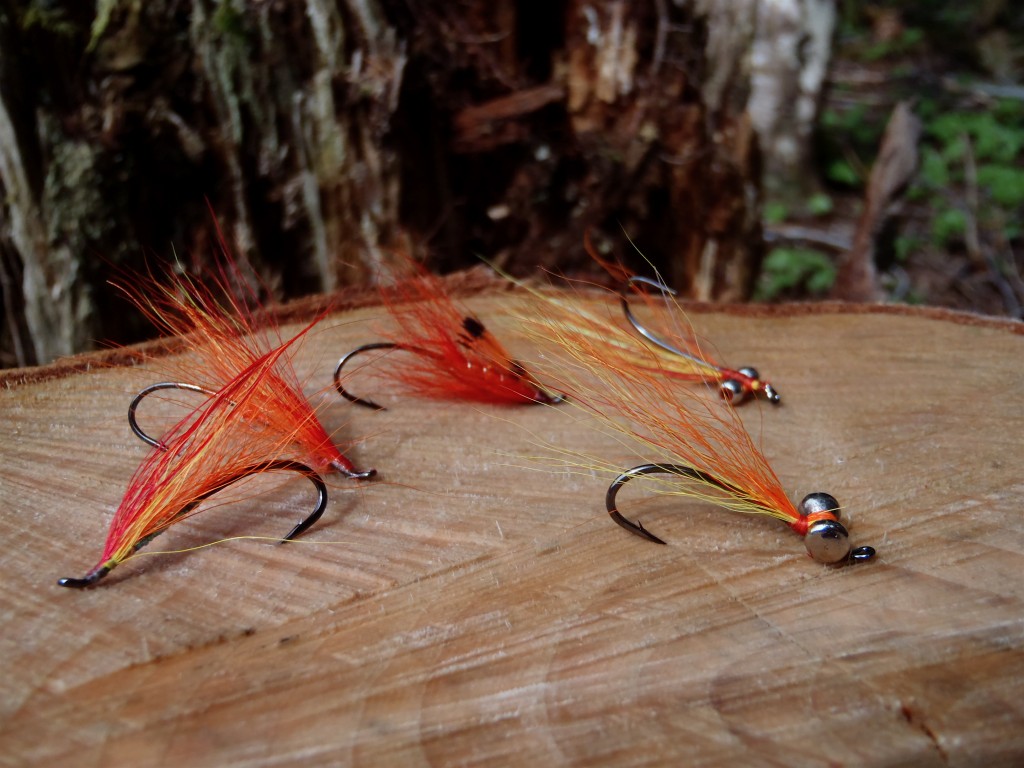 Bucktail, or calf tail, yellow,orange,red, and maybe a little chartuse