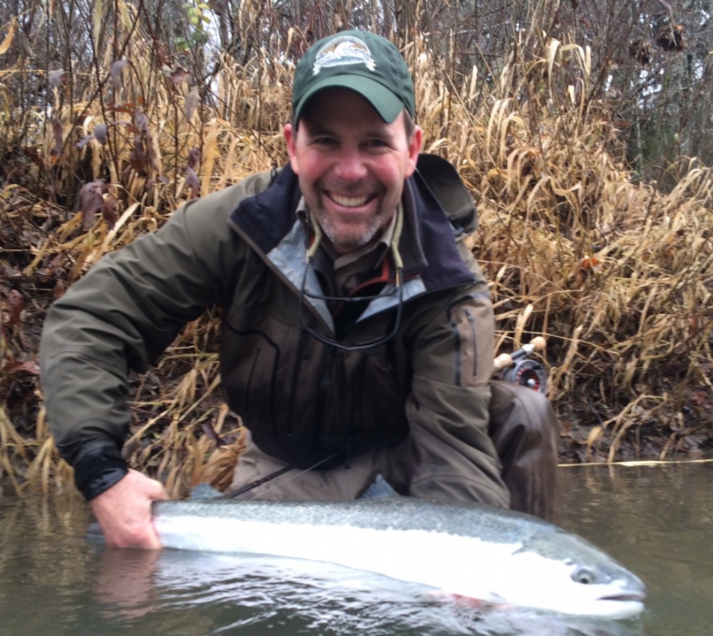 Bill with a perfect early native steelhead.  And so the battle of the fly shop hats begins