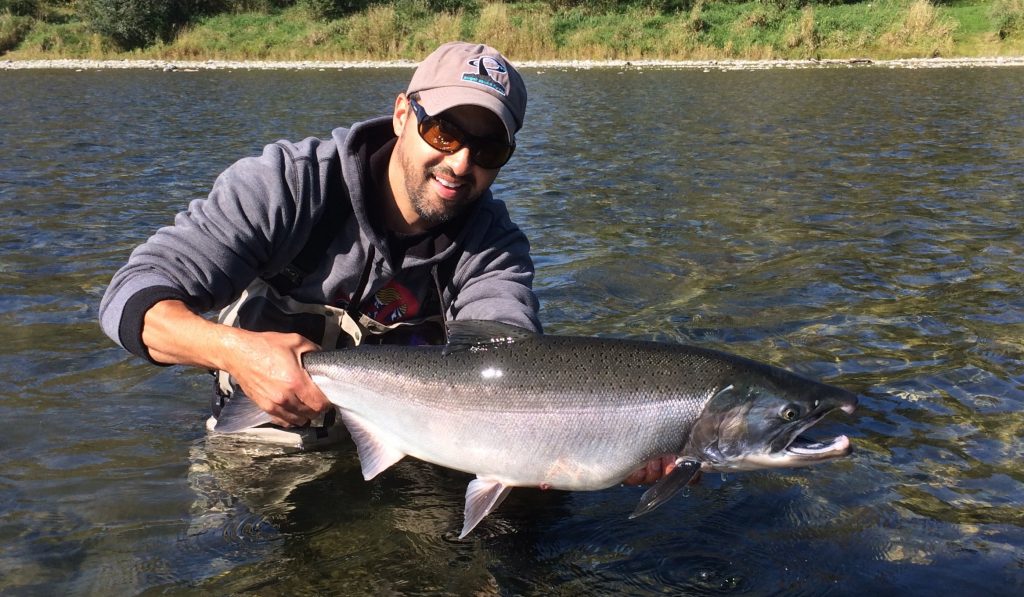 Anil coaxed this big buck coho off a cut bank in about 3 feet of crystal clear water 